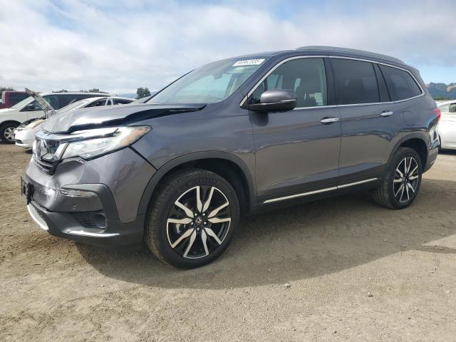 2020 HONDA PILOT TOUR — VIN 5FNYF6H66LB009613