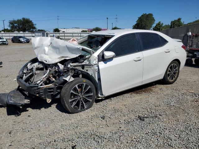 2017 TOYOTA COROLLA L — VIN 5YFBURHE3HP670306