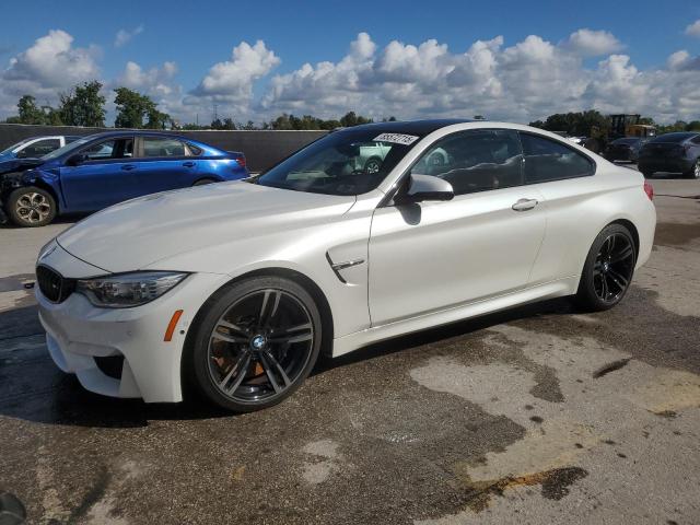 2016 BMW M4 — VIN WBS3R9C59GK338454